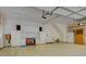 Spacious garage with white cabinets, ample storage, and a clean, well-organized workspace for various projects at 324 Quinby Way, Rock Hill, SC 29732