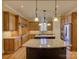 This spacious kitchen boasts custom cabinetry, granite counters, and stainless appliances at 324 Quinby Way, Rock Hill, SC 29732