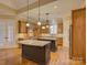 Elegant kitchen with granite countertops, dual islands, and custom cabinetry at 324 Quinby Way, Rock Hill, SC 29732