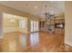 Spacious living room with hardwood floors, built-ins, and a stone fireplace at 324 Quinby Way, Rock Hill, SC 29732