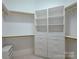 Well-organized walk-in closet with custom shelving and ample storage space at 324 Quinby Way, Rock Hill, SC 29732