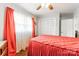 Bright bedroom with a ceiling fan, natural light, and closet with sliding doors at 400 Rhyne St, Stanley, NC 28164