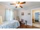 Comfortable bedroom with hardwood floors, a cozy bed, and decorative accents create a warm and inviting atmosphere at 400 Rhyne St, Stanley, NC 28164