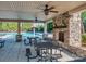 Poolside seating area featuring an outdoor fireplace and a view of the community pool at 4008 Widgeon Way, Waxhaw, NC 28173