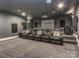 Luxurious theater room featuring comfortable recliners and a projector, creating an immersive entertainment experience at 4008 Widgeon Way, Waxhaw, NC 28173
