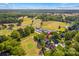 Aerial view of the property surrounded by lush greenery and a golf course at 422 Wildwood Dr, Salisbury, NC 28146