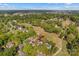 Beautiful aerial view of a neighborhood with mature trees and a lush golf course at 422 Wildwood Dr, Salisbury, NC 28146