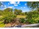 Scenic backyard view overlooking the golf course and mature trees at 422 Wildwood Dr, Salisbury, NC 28146