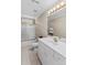 Bright bathroom with white vanity, toilet, and shower with gold accents at 422 Wildwood Dr, Salisbury, NC 28146