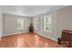 Bright bedroom with hardwood floors, plantation shutters, and ample natural light at 422 Wildwood Dr, Salisbury, NC 28146