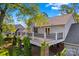 Exterior showcasing the second story deck with black metal railings at 422 Wildwood Dr, Salisbury, NC 28146