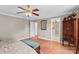Spacious main bedroom with hardwood floors, neutral walls, and view into tiled bathroom at 422 Wildwood Dr, Salisbury, NC 28146