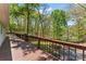 Expansive deck overlooking a wooded area, perfect for enjoying nature and outdoor living at 531 Hattaway Dr, Mount Gilead, NC 27306