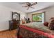Relaxing bedroom with a ceiling fan, private deck access, and natural light at 531 Hattaway Dr, Mount Gilead, NC 27306