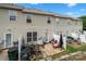Backyard patio with outdoor seating, a grill, and an AC unit at 5310 Glenlea Walk Ln, Charlotte, NC 28216