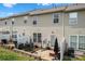 Backyard patio with outdoor seating, a grill, and an AC unit at 5310 Glenlea Walk Ln, Charlotte, NC 28216