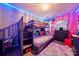 bedroom with a bunk bed, colorful decor, and a fun, playful atmosphere with LED ceiling lights at 5310 Glenlea Walk Ln, Charlotte, NC 28216