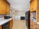 Kitchen featuring washer, dryer and refrigerator for ultimate convenience at 7516 Pageland Hwy # 3, Monroe, NC 28112