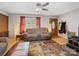 Cozy living room with hardwood floors and a wood burning stove at 7516 Pageland Hwy # 3, Monroe, NC 28112