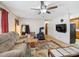 Inviting living room featuring a wood burning stove and mounted tv at 7516 Pageland Hwy # 3, Monroe, NC 28112