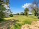 Wide open lot with a storage shed surrounded by mature trees at 7516 Pageland Hwy # 3, Monroe, NC 28112
