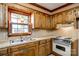Traditional kitchen features wooden cabinets, tile countertops and vintage appliances at 862 Eastwood Dr, Rock Hill, SC 29730