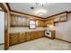Traditional kitchen with wooden cabinets, tile countertops, chandelier, and vintage appliances at 862 Eastwood Dr, Rock Hill, SC 29730