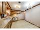 Traditional kitchen with wooden cabinets, tile countertops, chandelier, and vintage appliances at 862 Eastwood Dr, Rock Hill, SC 29730
