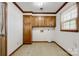 Unfinished Laundry Room features traditional flooring and vintage wooden cabinets at 862 Eastwood Dr, Rock Hill, SC 29730