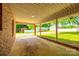 Wide covered patio area offers ample space for outdoor seating and entertaining, shed in background at 862 Eastwood Dr, Rock Hill, SC 29730