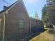 Brick home exterior with window and utility access on a sunny day at 8860 Castor Rd, Salisbury, NC 28146