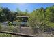 Overgrown swimming pool with mature trees and foliage at 8860 Castor Rd, Salisbury, NC 28146