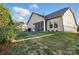 Large backyard with screen porch provides an area for outdoor enjoyment at 9565 Horsebit Ln, Concord, NC 28027