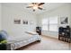 Cozy bedroom with a ceiling fan, window, carpet, and views of neighborhood at 9565 Horsebit Ln, Concord, NC 28027