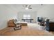 Spacious bonus room features plush carpet, ceiling fan, and space for entertaining and relaxing at 9565 Horsebit Ln, Concord, NC 28027