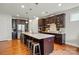 Spacious kitchen features a large island, stainless steel appliances, and ample cabinet space at 9565 Horsebit Ln, Concord, NC 28027
