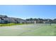 A serene tennis court offers a perfect area for sports and leisure at 9565 Horsebit Ln, Concord, NC 28027