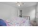 Bright bedroom featuring a ceiling fan and cozy decor at 1007 Doby Springs Dr, Charlotte, NC 28262