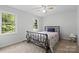 Bedroom with carpeted floor, natural light, and ceiling fan at 1007 Doby Springs Dr, Charlotte, NC 28262
