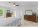 Bedroom with ceiling fan and two windows at 1007 Doby Springs Dr, Charlotte, NC 28262