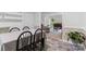Open-concept dining room showcasing seamless transition to the living room at 1007 Doby Springs Dr, Charlotte, NC 28262
