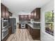 Spacious kitchen with stainless appliances and dark cabinets provide ample cooking space at 1007 Doby Springs Dr, Charlotte, NC 28262