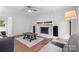 Bright Living Room with fireplace and natural light at 1007 Doby Springs Dr, Charlotte, NC 28262