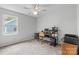 Bedroom currently being used as an office space with carpeted floors at 1007 Doby Springs Dr, Charlotte, NC 28262