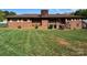 Charming brick home featuring well-maintained landscaping and a classic design at 1012 Burrage Ne Rd, Concord, NC 28025