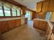 Functional kitchen with vintage cabinetry and a convenient double sink at 1012 Burrage Ne Rd, Concord, NC 28025