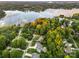 Stunning aerial view of a lakeside community with lush trees and beautiful homes at 1068 Grant Dr, Denver, NC 28037