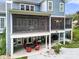 Spacious backyard with covered patio and seating area, ideal for outdoor entertaining at 1068 Grant Dr, Denver, NC 28037