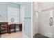 Bathroom featuring a glass-enclosed shower and a vanity with seating area at 1068 Grant Dr, Denver, NC 28037