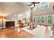 Spacious living room with hardwood floors, high ceilings, and abundant natural light at 1068 Grant Dr, Denver, NC 28037